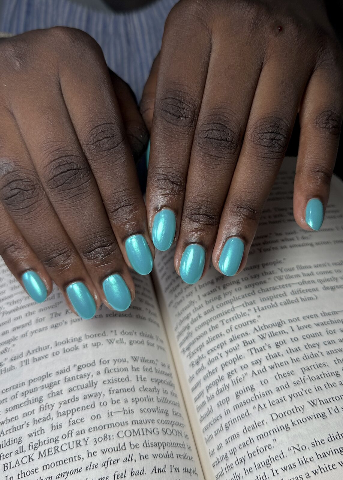 Olive chrome nails with three-dimensional leaf detailing